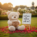 Beige 120cm teddy bear seated on a lawn holding the kawaii latte cup plush