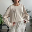 Beige cat print sweatshirt top with striped pyjama trousers
