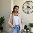 Beige blazer in a smooth matte fabric with a neutral sand tone