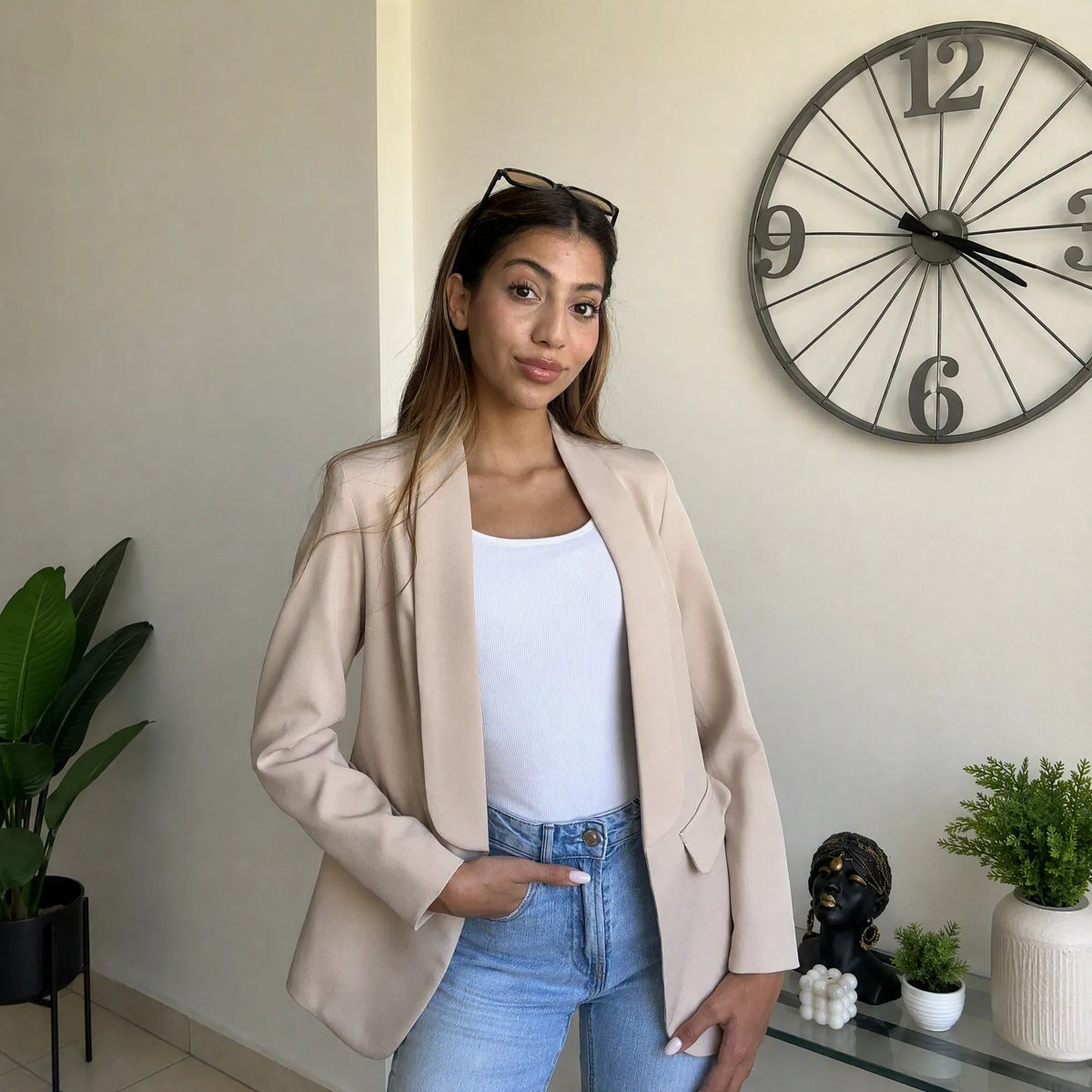Beige blazer in a smooth matte fabric with a neutral sand tone