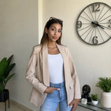 Beige blazer in a smooth matte fabric with a neutral sand tone