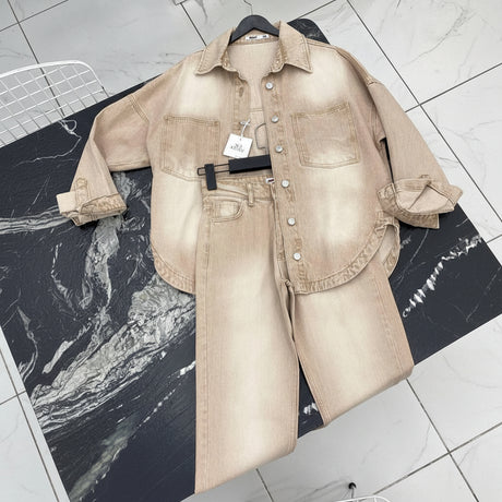 Beige utility jacket back angle showing relaxed oversized cut
