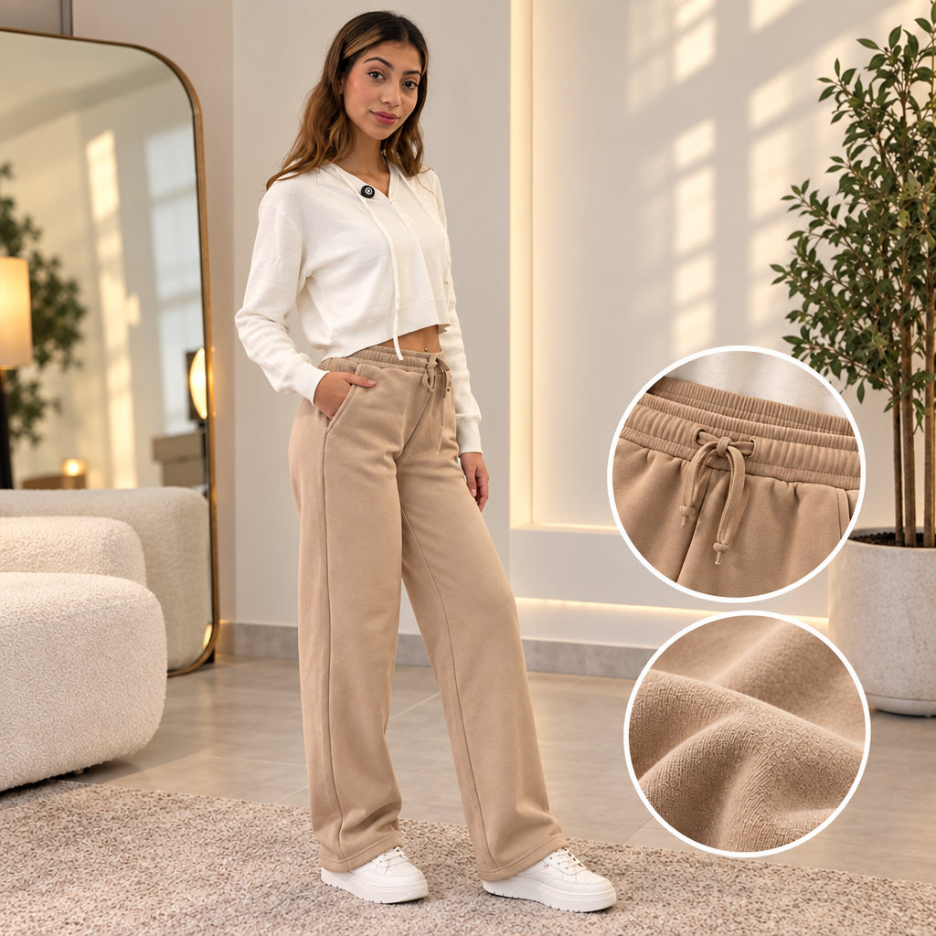 Beige wide leg sweatpants worn with a cream cropped top, with close ups of the drawstring waist and fabric