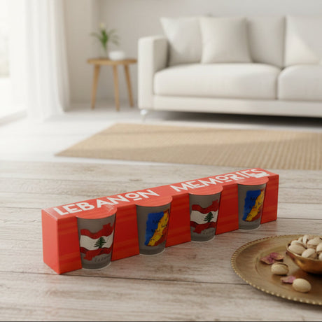Four frosted glass tumblers in a red box, printed with the flag and a blue and yellow map