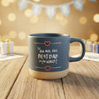 Blue mug with 'You are the best dad in the world!' text on a wooden surface