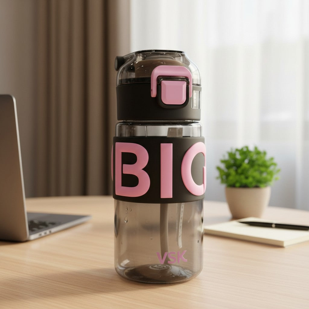 Black 500ml grip water bottle with bright pink lettering