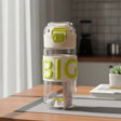 White 500ml grip water bottle with lime green lettering