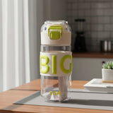 White 500ml grip water bottle with lime green lettering