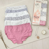 Plus size pink, grey and white briefs with dot and floral prints next to their pack