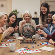 Friends playing bingo around a table with the wire ball cage, lotto cards and marker chips