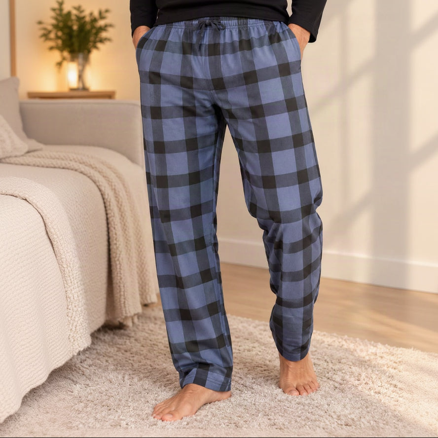 Close up of blue and black buffalo check pyjama trousers with side pockets