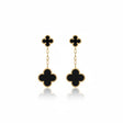 Black clover-shaped earrings on a white background