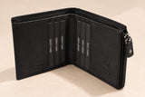 Interior of the small black wallet with rows of vertical card slots and a zip edge
