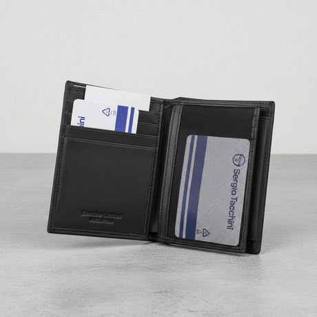 Black leather wallet with cards opened on a light grey background