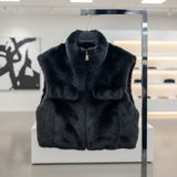 Black faux fur vest front view with plush texture detail