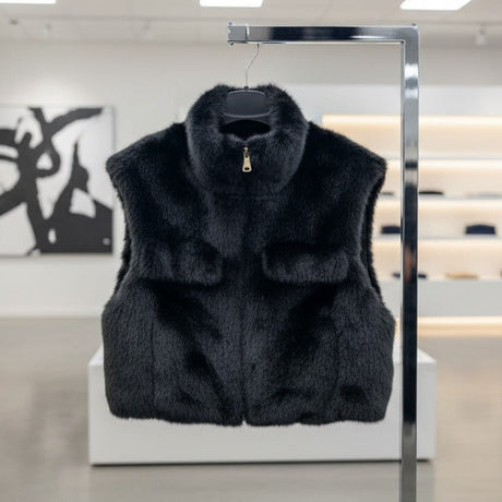 Black faux fur vest front view with plush texture detail