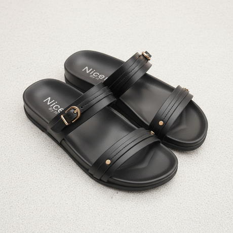 Black sandals with 'Nice' branding on a light gray background