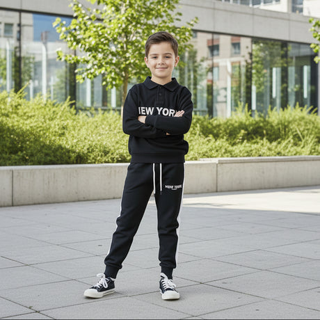 Black two piece collar sweatshirt and jogger set with a white side stripe worn outdoors