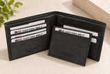 Black nubuck bifold wallet open with a slim matching card holder resting inside