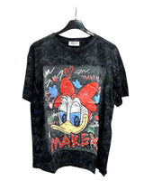 Oversized black tshirt with a colorful front print of Daisy Duck character, displayed on a hanger