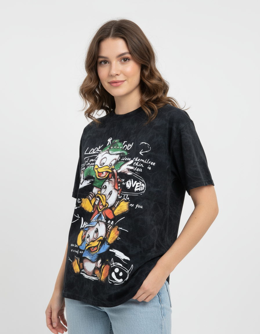 Woman wearing a black tshirt with cartoon duck character design on a white background