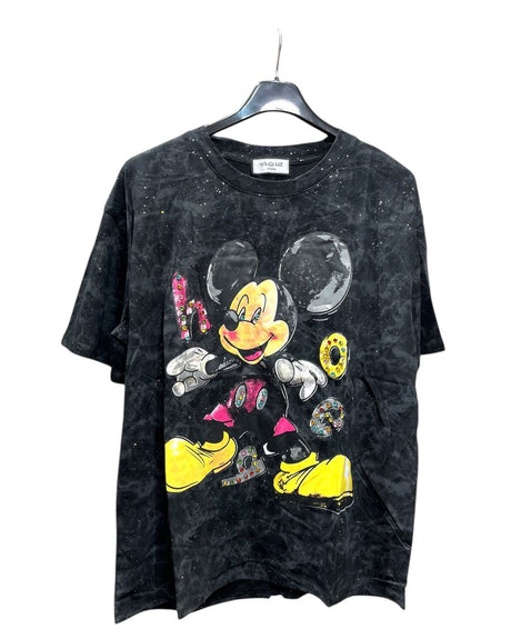 Black tshirt with colorful graphic design of miceky mouse on a hanger against a white background.
