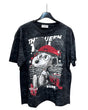 A black oversized tshirt featuring a graphic print of snoopy wearing a red hat 