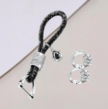 Black rhinestone rope keychain with a black crystal teardrop charm and spare rings
