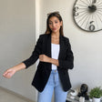 Women's black longline blazer, open front with a slim shoulder and hip length cut