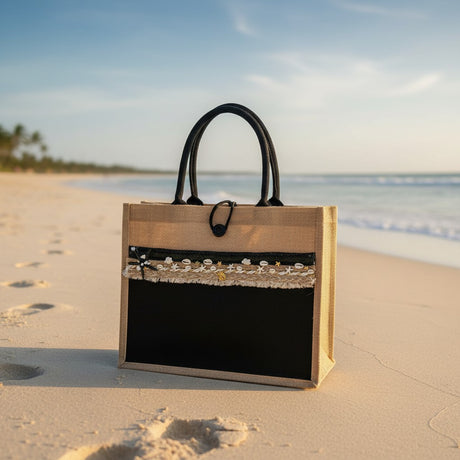 Handmade black and jute beach tote with seashell trim on the sand, Jack Gifts Online Lebanon