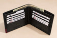 Black leather bifold wallet with a burgundy corner, open with notes and cards inside