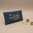 Denim blue woven long clutch wallet embroidered in gold with a cedar tree and Beirut