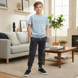 Boys light blue tee with a grey Design print and navy cargo joggers, two piece boys set