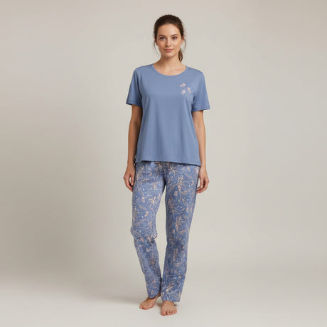 Blue floral pajama set on a tiled floor