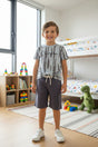 Boys grey tie dye tee with a script print and dark grey shorts, two piece summer set