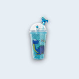 Aqua glitter tumbler with a dome lid, blue straw and a long neck dinosaur print