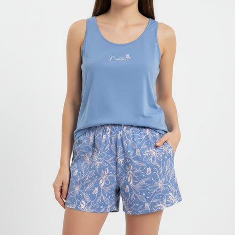 Close-up of women's aqua pyjama set top and shorts - soft breathable fabric detail