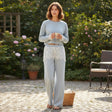 Woman in powder blue lace trim sweatshirt and wide leg pants set, Jack Gifts Online Lebanon