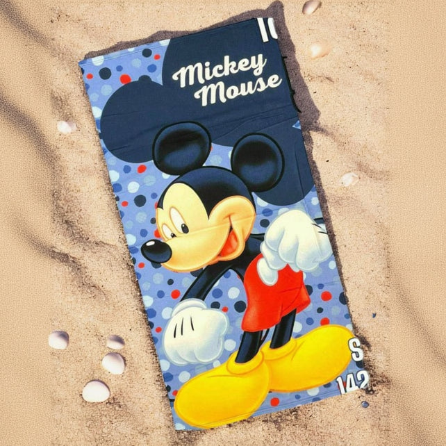 Light blue confetti dot beach towel with a standing Mickey Mouse print and navy top band