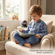 Boy reading in a blue and white plaid fleece pyjama top with matching blue bottoms