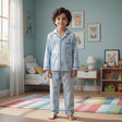 Boy in a light blue button through pyjama set with navy piping, Jack Gifts Online Lebanon