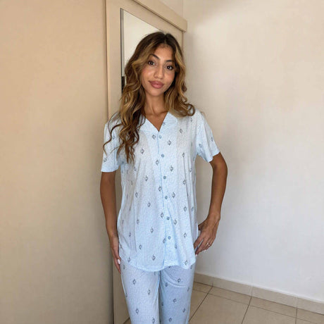 Small motif print and front buttons on a light blue pyjama shirt