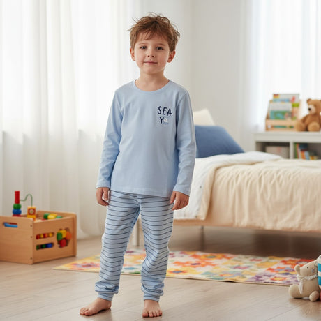 Boy in a light blue pyjama top with sailboat motif and striped pants, Jack Gifts Online Lebanon