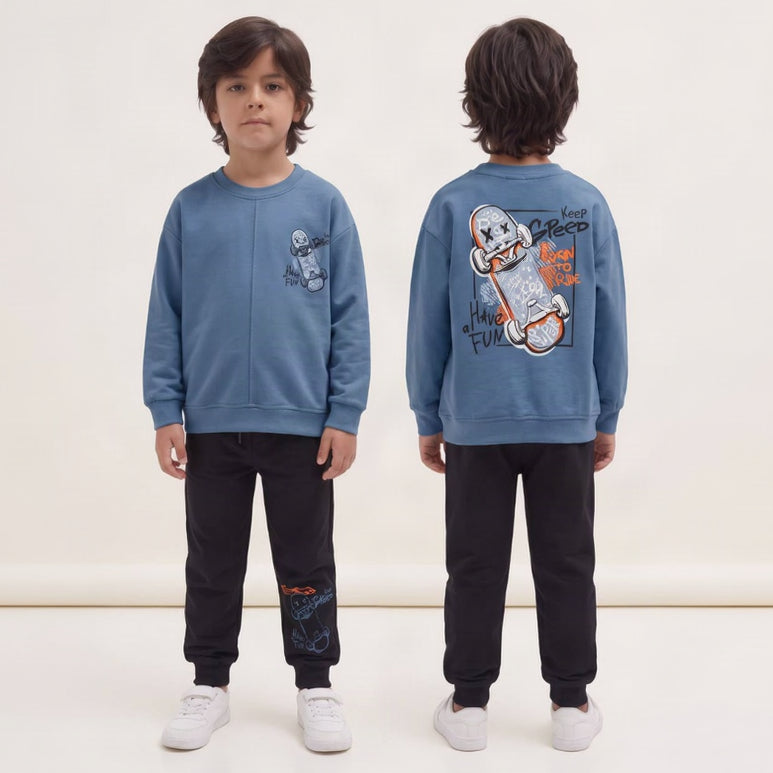 Boy in the blue skateboard jogging set shown from the front and the back
