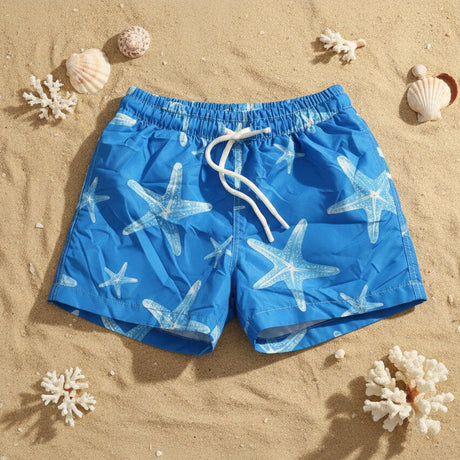 Blue starfish print boys swim shorts on the sand – Jack Gifts Online Lebanon