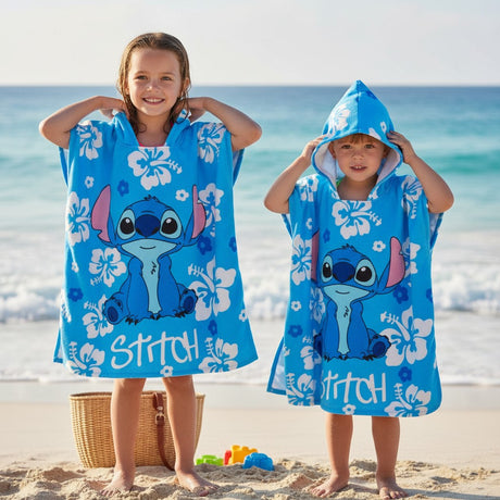 Kids wearing blue Stitch hooded poncho towels at the beach – Jack Gifts Online Lebanon