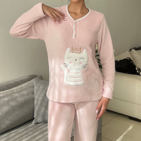Blush pink pyjama top worn with a raised arm showing the relaxed sleeve