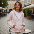 Woman in blush pink zip hoodie with lilac tassel drawstrings, Jack Gifts Online Lebanon