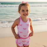 Girls pink bow stripe swimsuit with matching shorts on the beach – Jack Gifts Online Lebanon