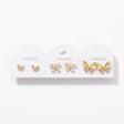 Crystal bow, crystal butterfly and large gold bow stud earrings on one card